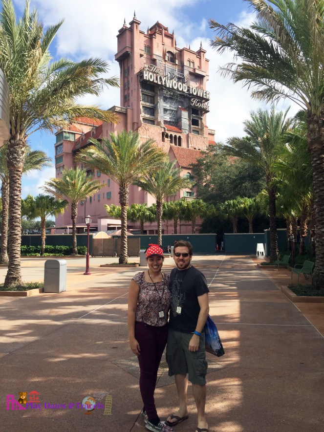 Getting our money shot in front of the Tower of Terror ride, one of our favorite rides in the park!