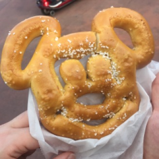 Grabbing the obligatory Mickey pretzel post-tour